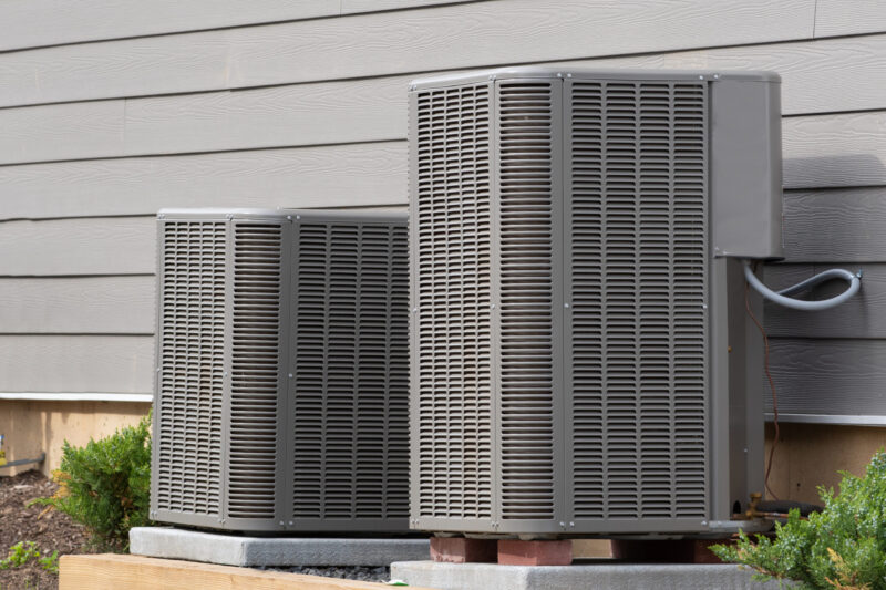 two air conditioning units installed outside a home in jupiter